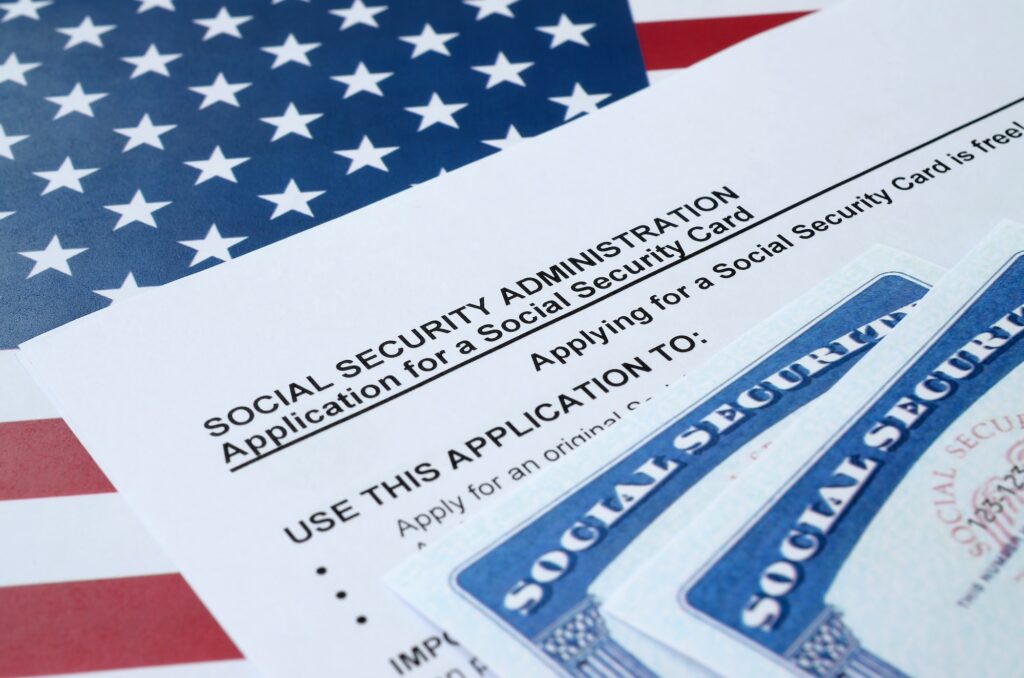 United States social security number cards lies on Application from social security administration